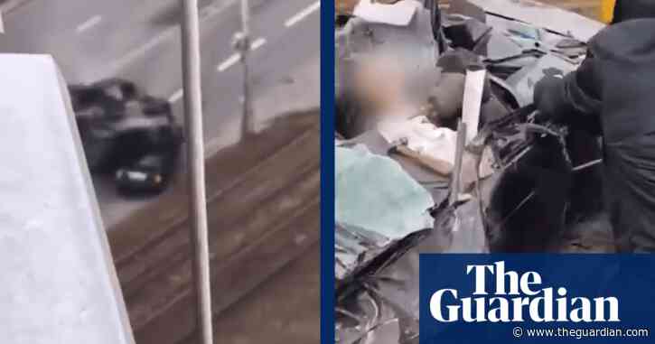 Ukrainian man survives after military vehicle swerves and drives over his car – video