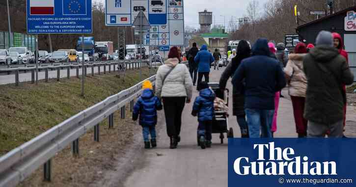 ‘Terrible and fantastical’: fear and farewells on the road out of Ukraine