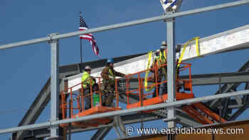 Steel beam covered in signatures installed as Mountain America Center moves closer to completion - East Idaho News