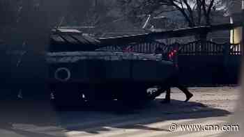 Video shows man try to stop Russian tank with his body