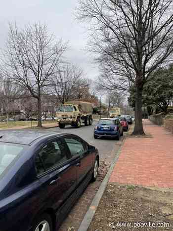 "Military transport trucks rolling down 3rd St SE with a Capitol Police escort." - PoPville