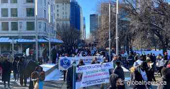 Demonstrators gather in downtown Calgary demanding justice for Latjor Tuel - Global News