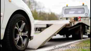 Tow truck driver, passenger left injured by car on Interstate 394