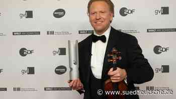 Geiger Hope mit ukrainischem Musiker bei Friedensandacht - Süddeutsche Zeitung