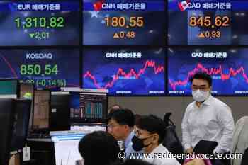 S&P/TSX composite down, oil tops US$100 a barrel - Red Deer Advocate