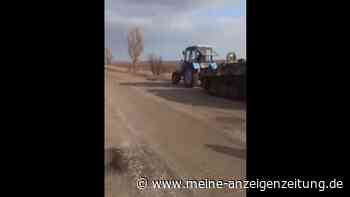 Kurioses Video aus der Ukraine: Bauer mit Traktor schleppt russischen Panzer ab