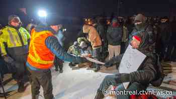 Police deliver injunction to demonstrators blocking rail tracks in Saint-Lambert - CTV News Montreal