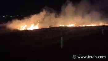 Austin Fire works to put out brush fire near Travis County Expo Center