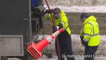 With rain on the way, city crews are clearing out frozen storm drains to keep the water moving