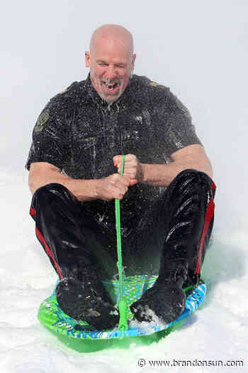 Police officers stage frosty fundraiser - The Brandon Sun