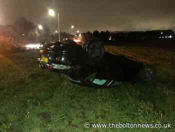 Motorists overturns new car in Bolton - The Bolton News