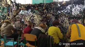 Etsy buyers purchase digital goods to help Ukrainian artists and small businesses. A Ukrainian weaver who usually makes belts is now making camouflage nets for troops