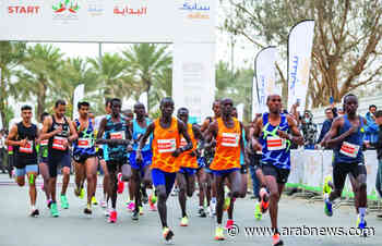 Record 10000 runners hit the road in Saudi Arabia's first international marathon - Arab News