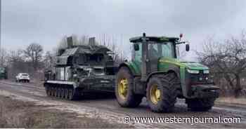 Russia's Humiliation: Ukrainian Tractor Reportedly Recorded Towing One of Putin's Defeated Missile Systems