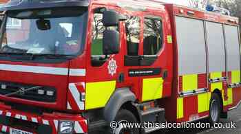 Man treated by ambulance crews after Putney flat fire