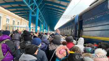 Ukrainian families flee Zaporizhzhia on overcrowded trains after Russians seize nuclear power station