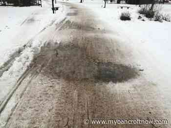 Flood warnings remain, snowmobile trails close as warm weather continues