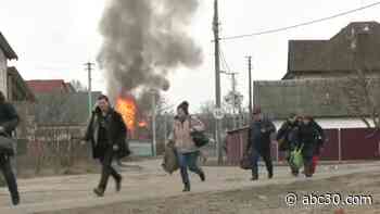 People flee embattled Ukrainian cities along safe corridors