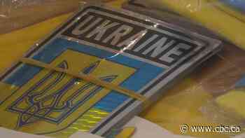 Demand for Ukrainian flags on the rise in Ottawa - CBC.ca