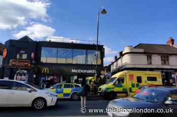 McDonald's Mitcham: Person taken to hospital after incident