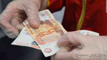 How Putin 'destroyed' the ruble and brought Russia to the brink of default