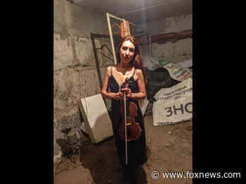 Ukraine's 'cellar violinist' plays on as she shelters from bombs