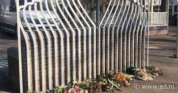 Geel-blauw 'bloemenhart' in Houten voor slachtoffers van de oorlog in Oekraïne - AD.nl