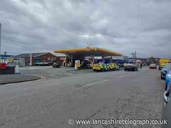 Blackburn road closed as man hit by car close to Shell garage