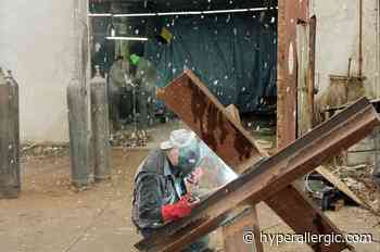 Ukrainian Sculptor From Berlin Stays In Lviv To Help Build Anti-Tank Defenses