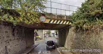 Massive articulated lorry in Redruth stuck under railway bridge - Cornwall Live