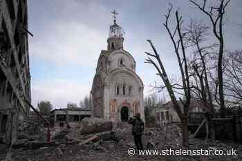 Russian convoy fans out around Kyiv, new satellite photos show - St Helens Star