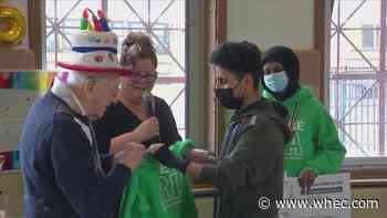 Rochester International Academy students surprise veteran for his birthday