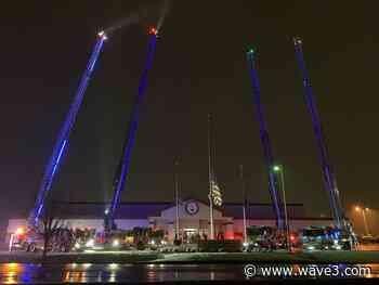 Firefighters honor K-9 Dash with blue ladders outside Shepherdsville PD - WAVE 3