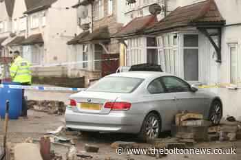 Pedestrian killed as car crashes into house - The Bolton News