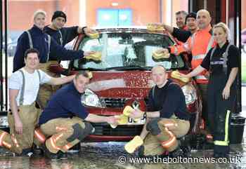 Charity car wash in Farnworth in support of Ukraine - The Bolton News