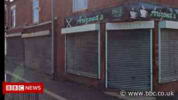 Oldham cafe owner fined for using neighbour's bins - BBC
