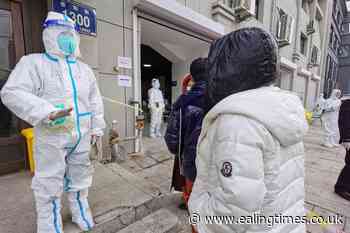 China tightens controls as more virus cases reported - Ealing Times