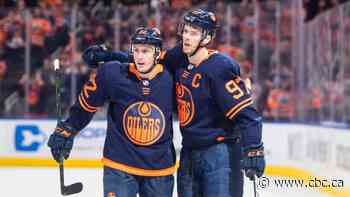 McDavid scores twice, Koskinen makes 30 saves to lift Oilers past Lightning