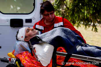 At least 35 killed by Russian airstrike on base near Polish border, Ukrainian officials say