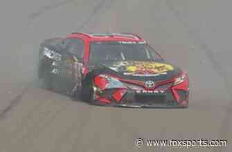 Martin Truex Jr. slams the wall after tire goes down