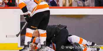Laughton suffers head injury after taking hit, scary spill into boards - NBC Sports