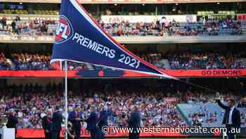 Melbourne Demons unfurl historic AFL flag - Western Advocate