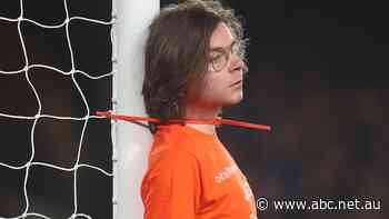 Protester zip ties himself to goalpost during Everton-Newcastle United clash