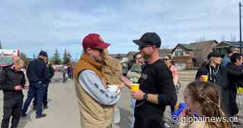 Calgary firefighter survives cancer to complete fitness challenge in honour of little boy