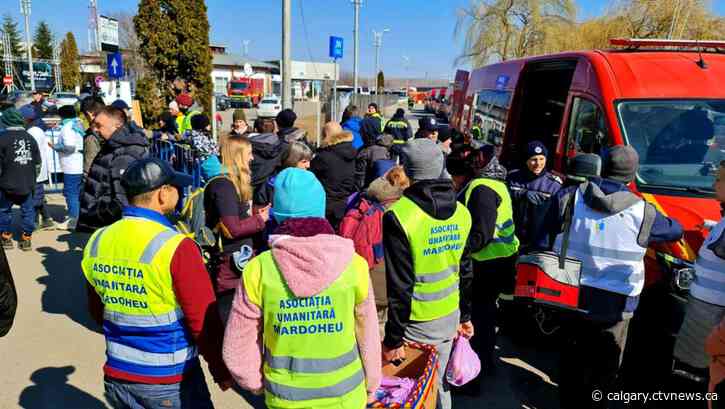 Calgary couple puts vacation plans on hold to aid Ukrainians fleeing to safety