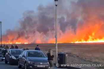 Fire crews tackle blaze on marshland on the Wirral - Ealing Times