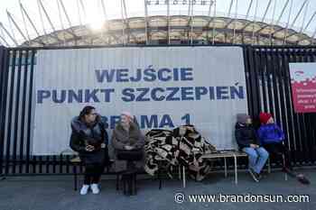 Priceless paper: Refugees get IDs for new lives in Poland - The Brandon Sun