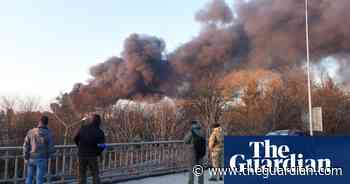 Smoke rises over Lviv as Russian missiles hit aviation repair plant – video - The Guardian