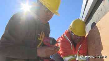 Students help save Regina Food Bank $60K by reroofing building as part of their classes