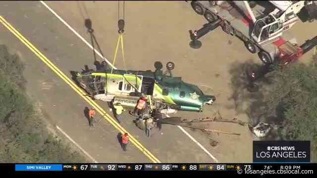 Crane Hoists Wreckage From LASD Helicopter Crash In Angeles National Forest
